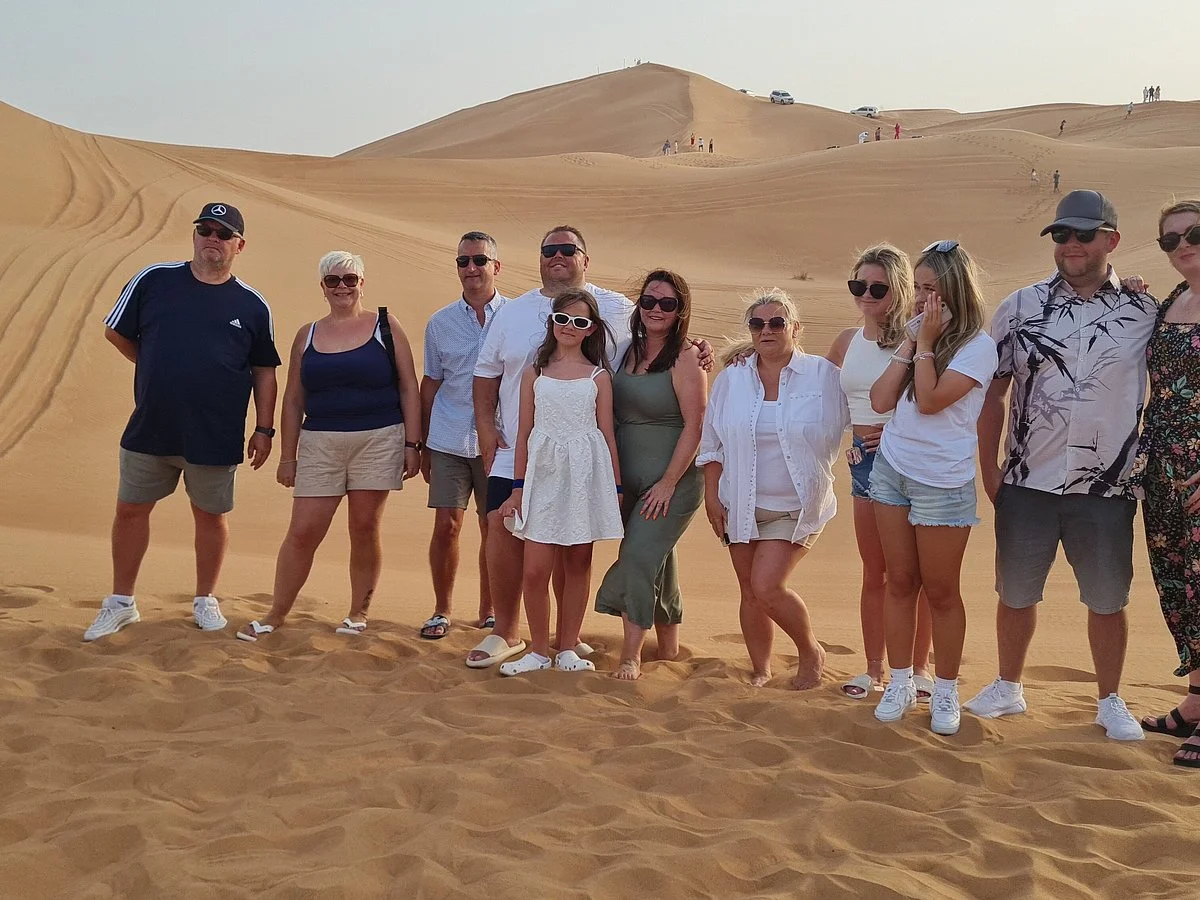 Dubai Desert Safari experience with golden sand dunes at sunset